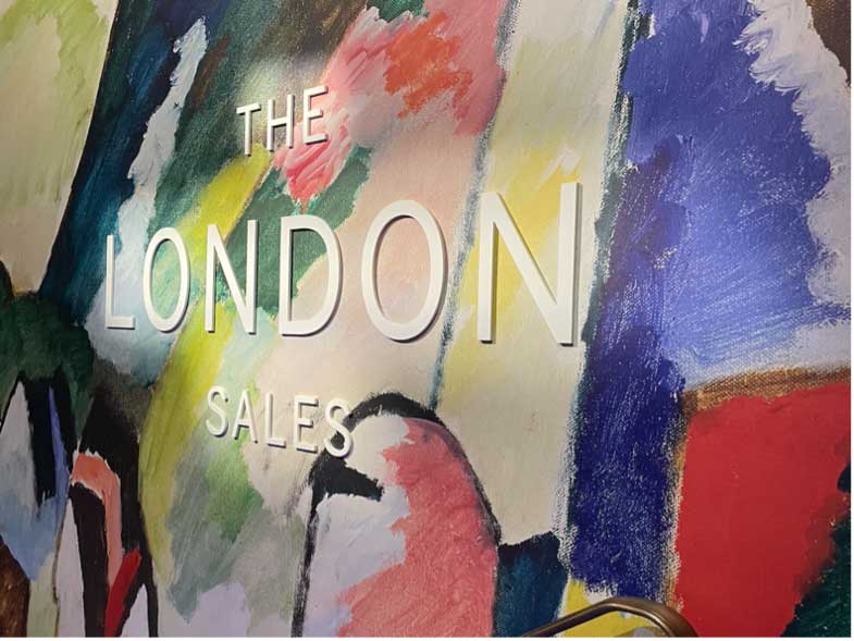 Image of a colorful, abstract sign that says "THE LONDON SALES"
