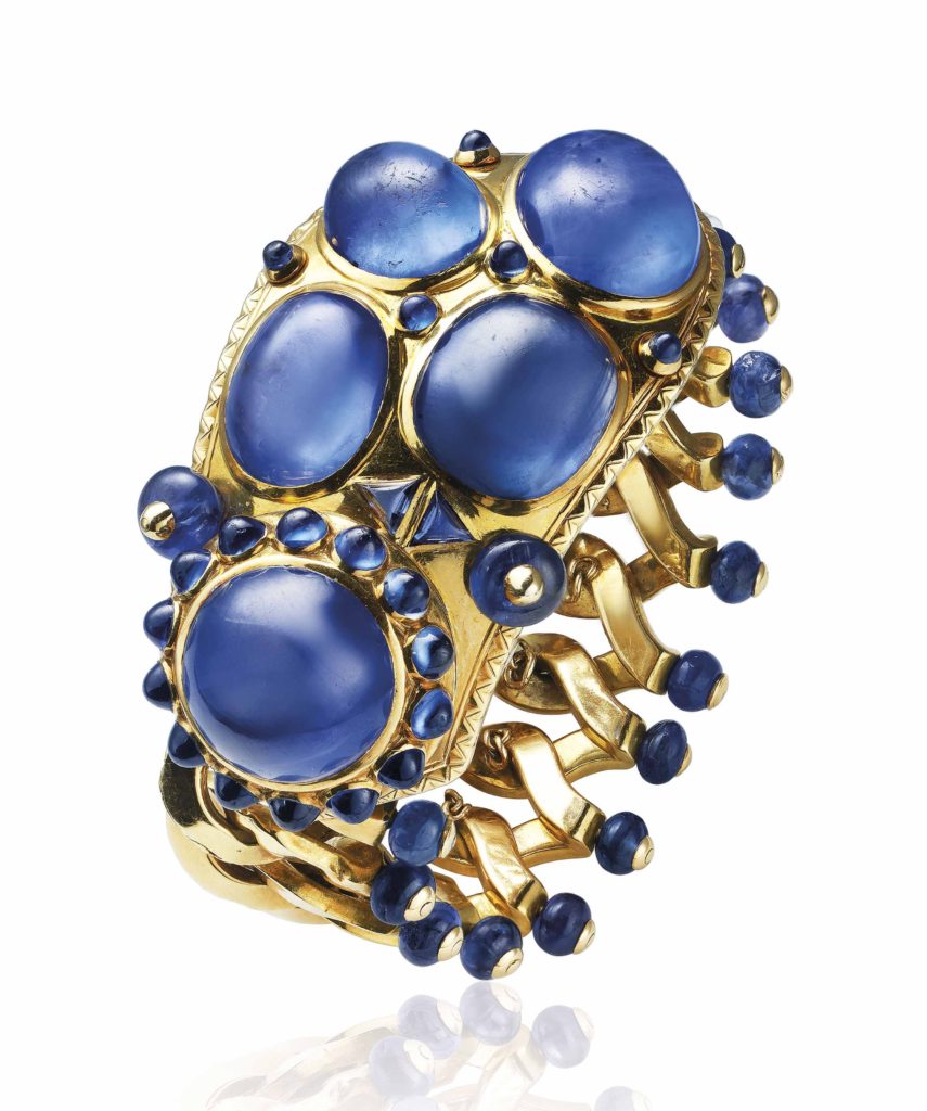 Sapphire and gold elaborate bracelet by luxury jewelry brand Cartier
